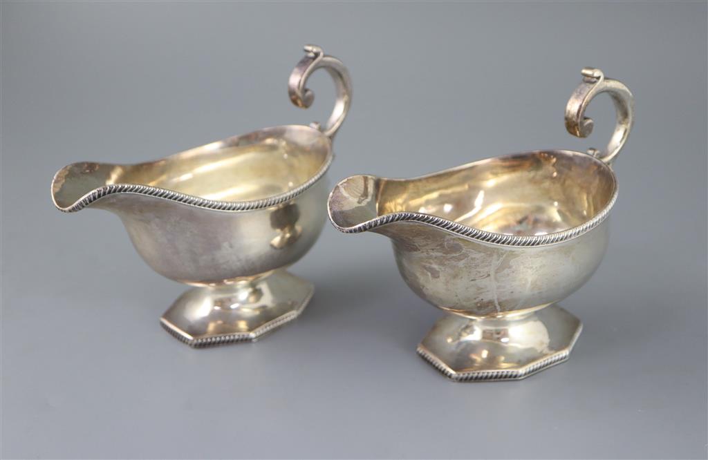 A pair of late Victorian silver pedestal sauceboats, by Roskell, Roskell & Hunt, 22oz.